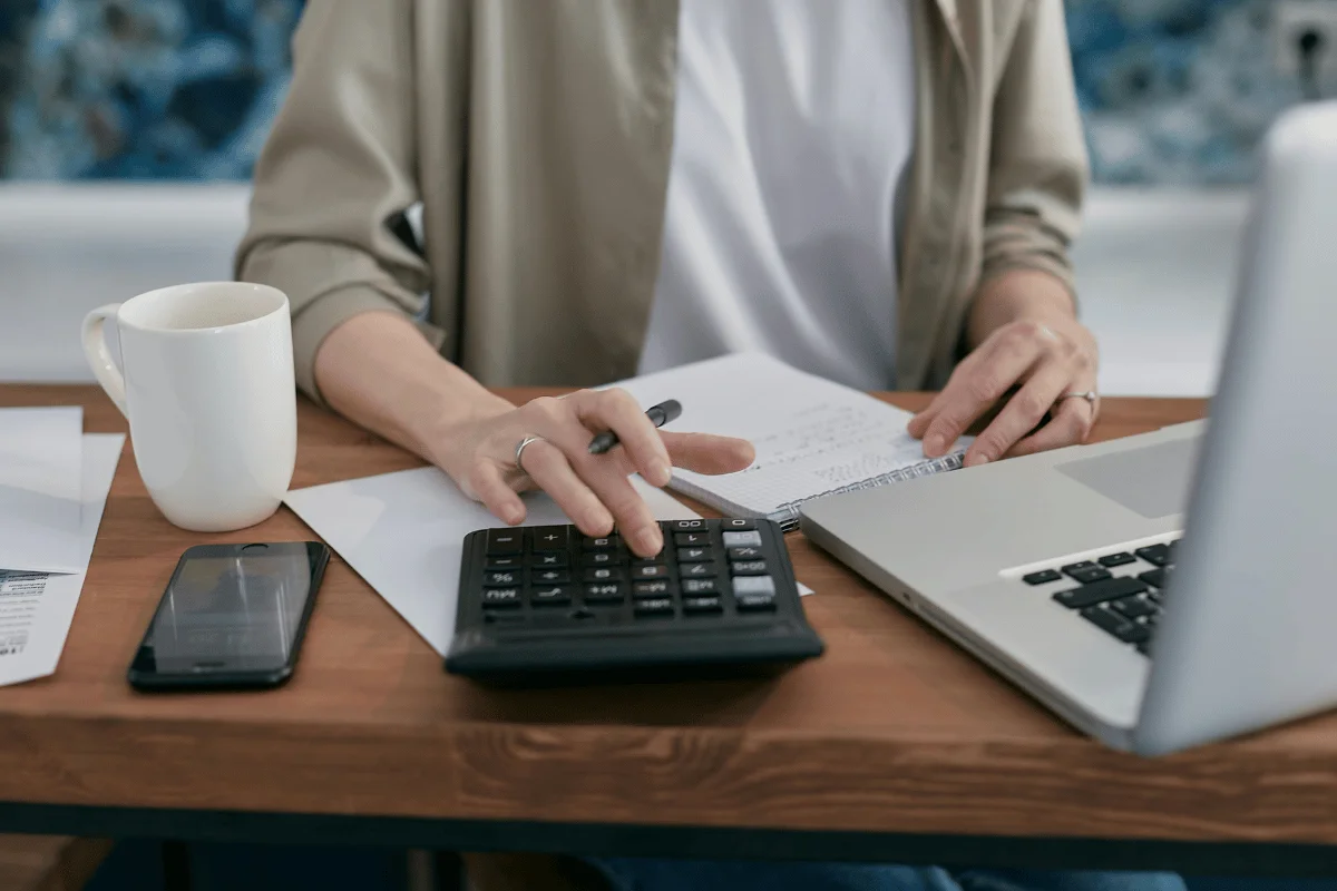 cpa using a calculator showing professional evaluation